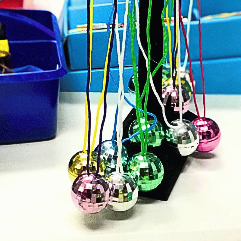 disco ball necklaces hanging