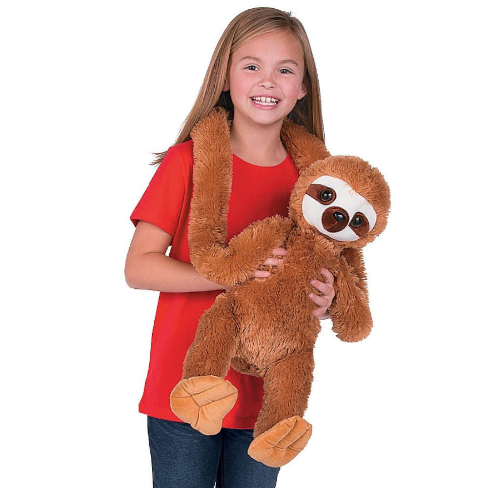 girl holding large carnival prize sloth