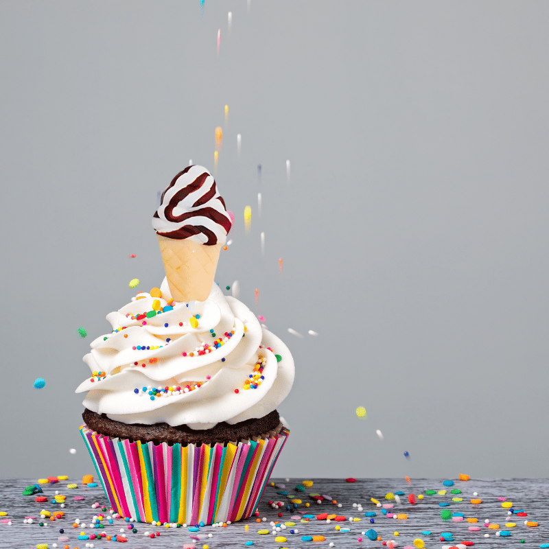 ice cream lollopop in a cupcake