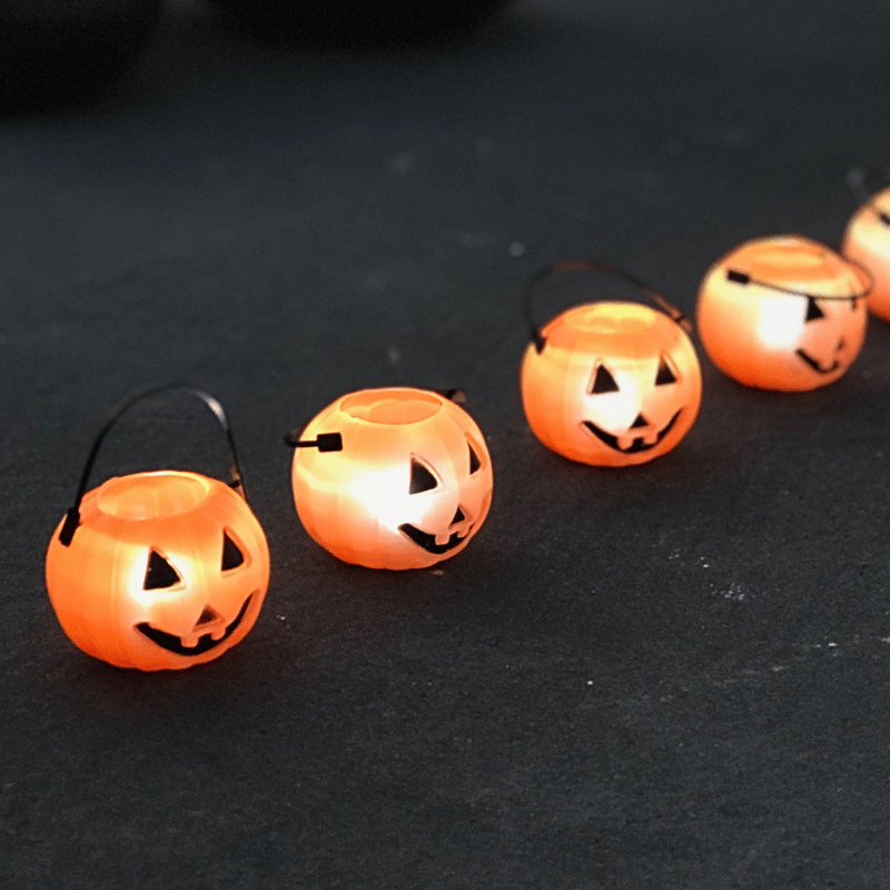 small pumpkin pails with lights